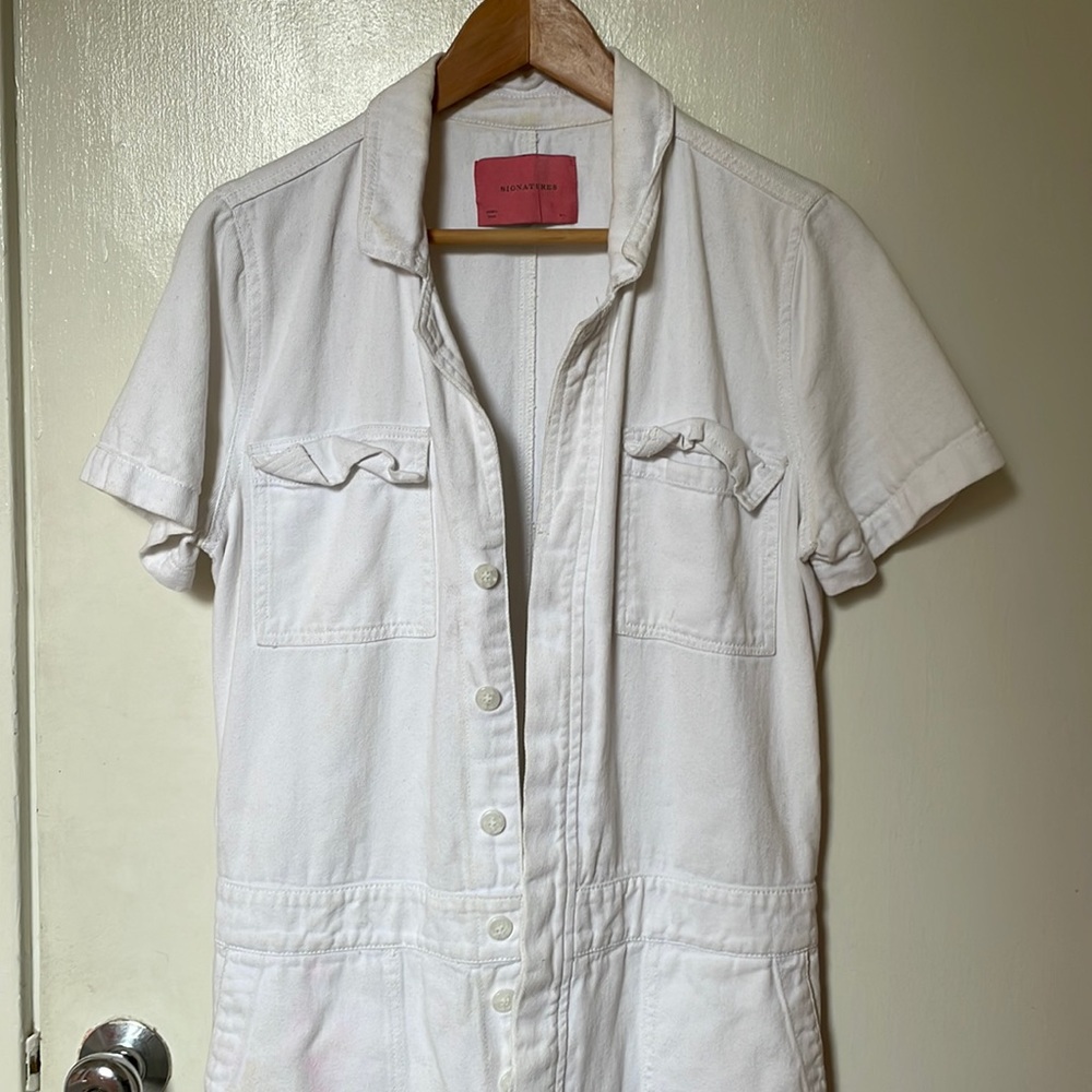 A signatures white jumpsuit.